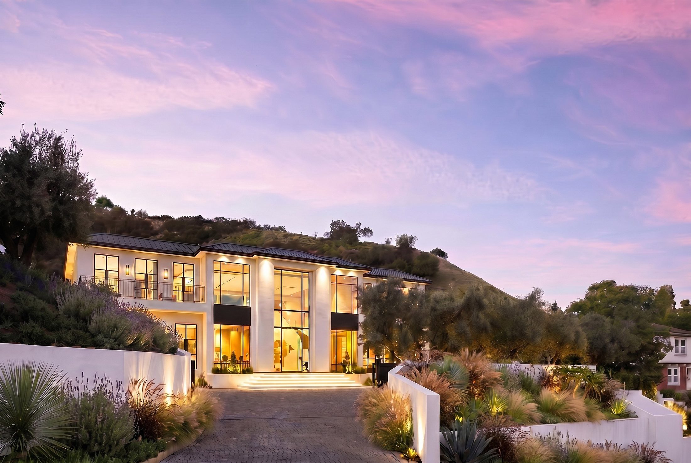 Oliveto Vale — a Bel-Air residence by Beverly Hills One, twilight elevation. Photography by Andrew Bramasco